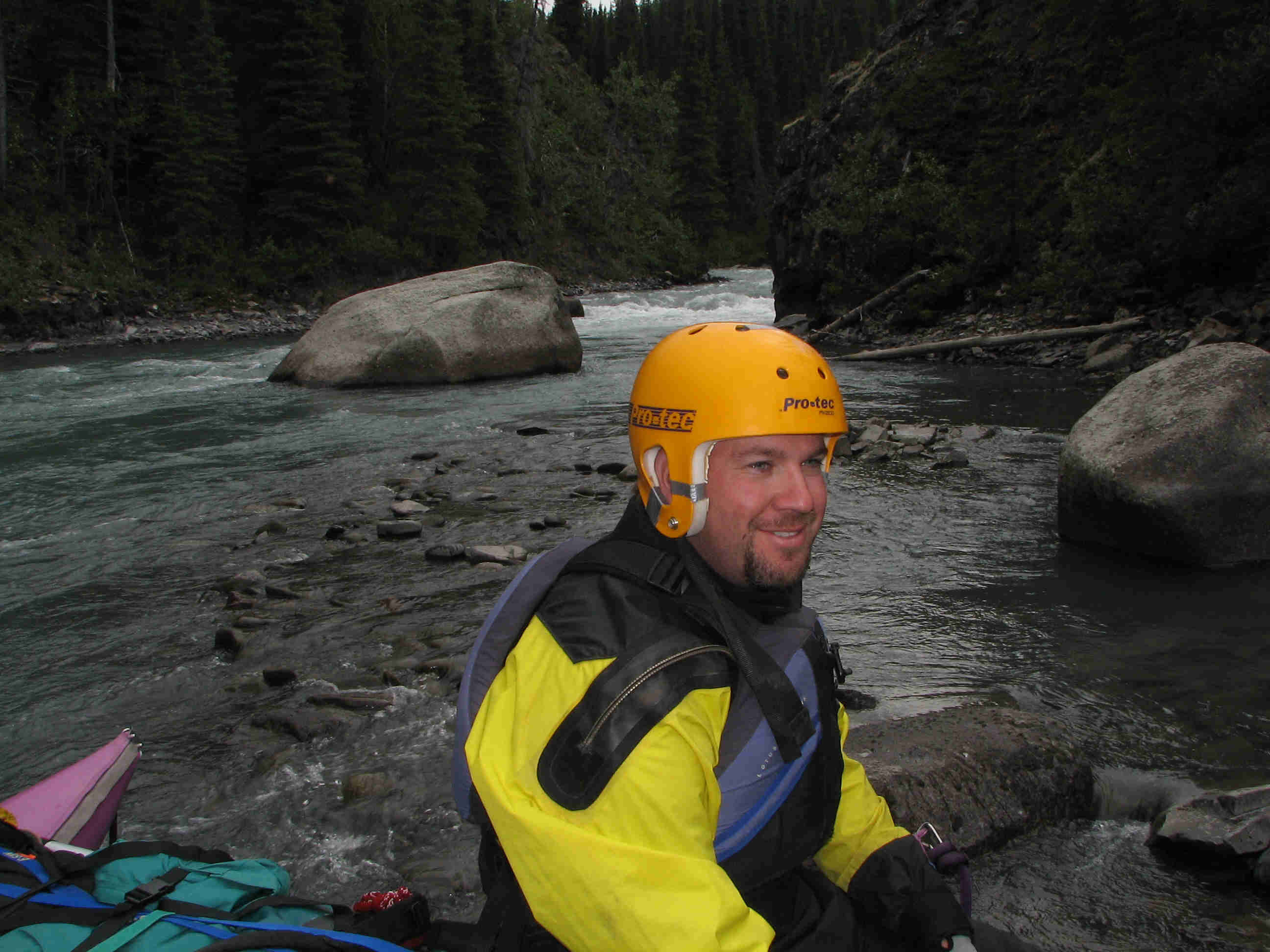 Rest stop below a whitewater rapid on Happy River - Helmet and Drysuit - ALASKA RAFT CONNECTION 